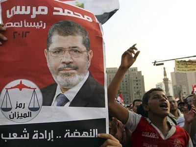 Mohamed Mursi en los carteles de sus defensores