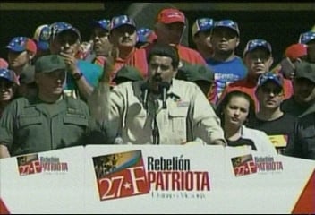 Rosa, al lado del vicepresidente Maduro