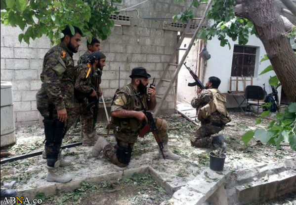 Abu Hajer, comandante del Batallón Zolfaghar, combate en Siria para proteger el gobierno de Assad