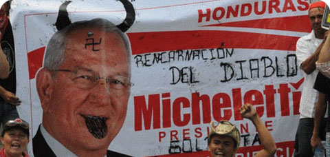 Pancarta alusoria al dictador Micheletti