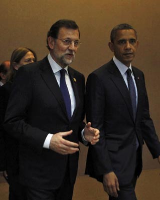 Rajoy y Obama
"Sé que nuestros equipos están trabajando muy bien juntos", le dijo el presidente estadounidense al español en un breve encuentro de dos minutos en Seul.