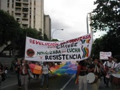 Pancarta de ASGDRe en movilización por los derechos de las personas con diversa orientación sexual