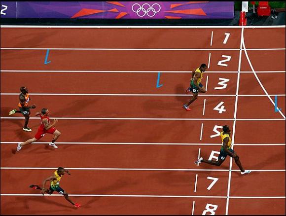 Bolt hace historia y Jamaica arrasa en los 200 metros