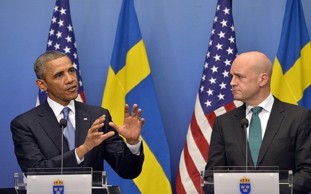 Barack Obama y Frederik Reinfeldt