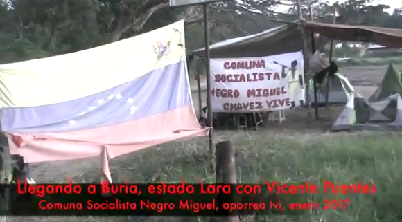 En la entrada principal del predio recuperado Bicentenario de Zamora, en Buría, nos recibió un afiche de la Comuna Socialista Negro Miguel