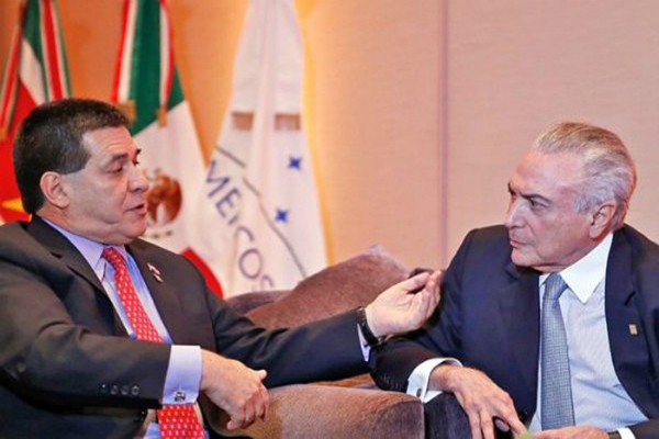 Horacio Cartes, presidente de Paraguay, y Michel Temer, quien asumió el poder de facto en Brasil.
