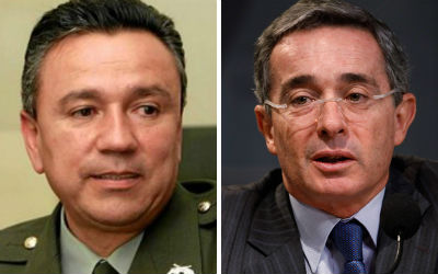 Mauricio Santoyo y Alvaro Uribe.