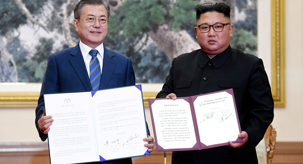 Moon Jae-in (Sur) y Kim Jong-un (Norte)
