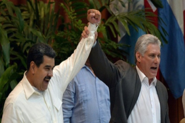 Los presidentes Canel y Maduro.