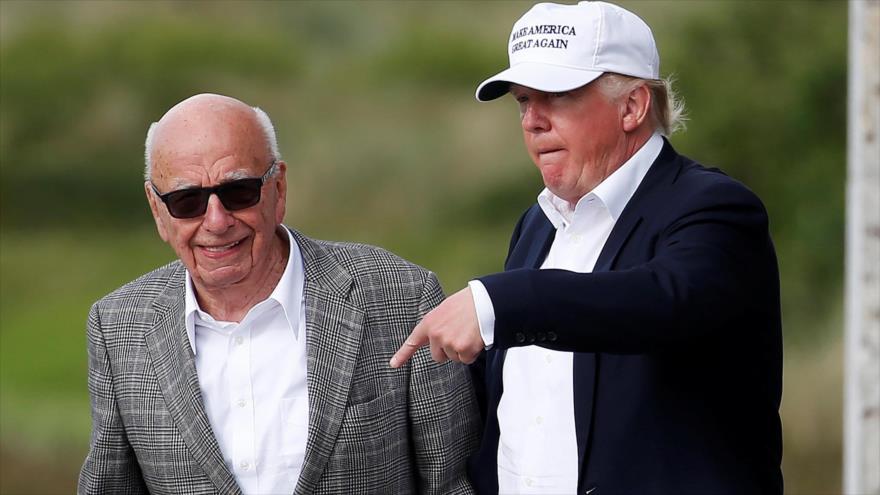 El fundador del imperio mediático News Corp, Rupert Murdoch (izda.), y el presidente de EE.UU., Donald Trump