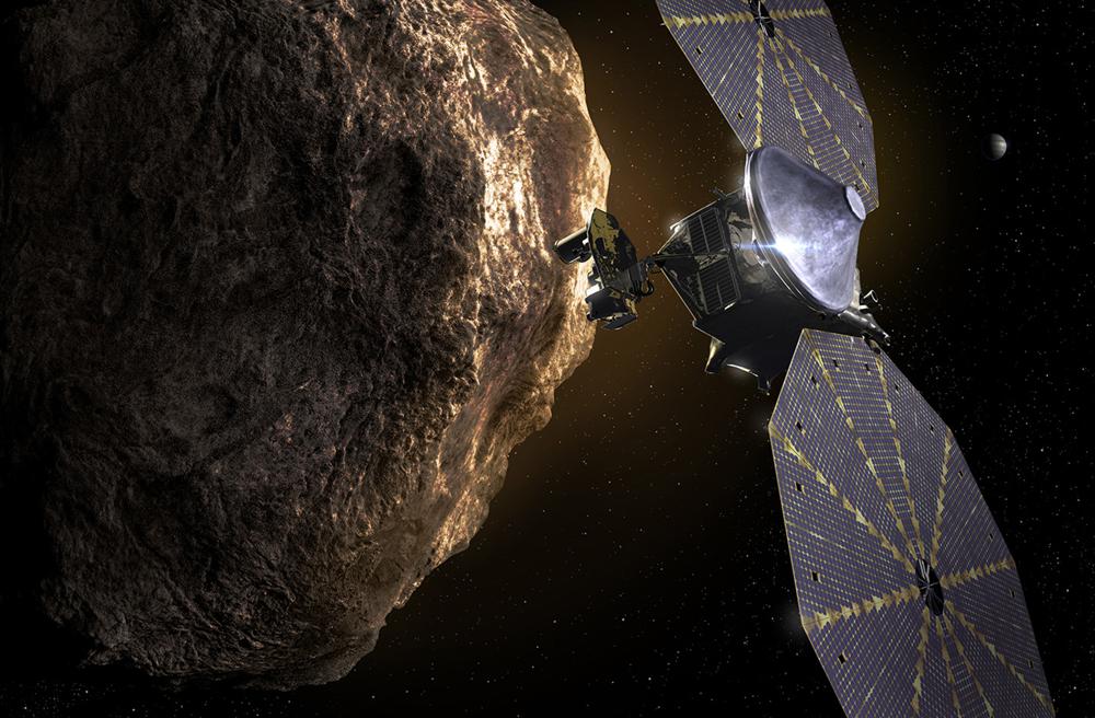 Imagen proveída por el Southwest Research Institute muestra la sonda espacial Lucy acercándose a un asteroide. La NASA está debatiendo si trata de reparar un panel solar trabado en su recién lanzada sonda Lucy, en ruta a explorar un número sin precedentes de asteroides