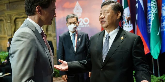 El  primer ministro canadiense Justin Trudeau y el presidente chino Xi Jinping