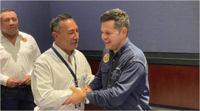 El presidente de la estatal colombiana, Ricardo Roa, junto al presidente de la Unión Sindical Obrera, César Loza