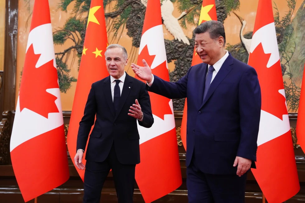El primer ministro canadiense, Mark Carney jungto al presidente de China, Xi Jinping